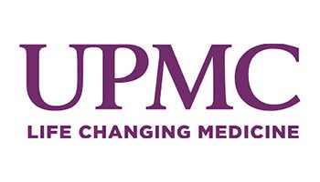 A purple and white logo for upmc.
